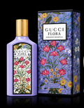 Gucci Flora Gorgeous Magnolia Eau de Parfum bottle and box on black background